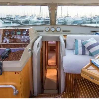 Aegean Gateaways guest cabin with double bed and storage